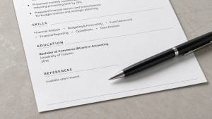 Job seeker reviewing a CV references section before submitting a job application